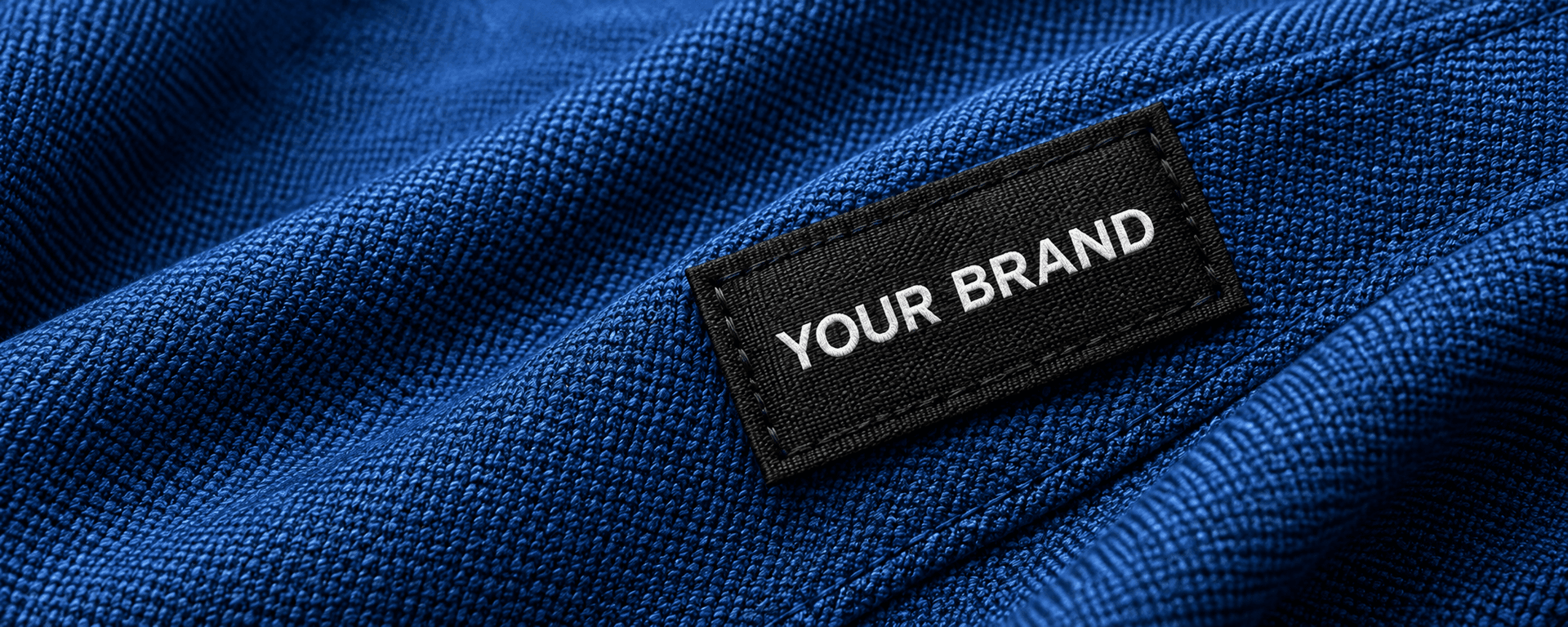 Macro blue fabric with branded label