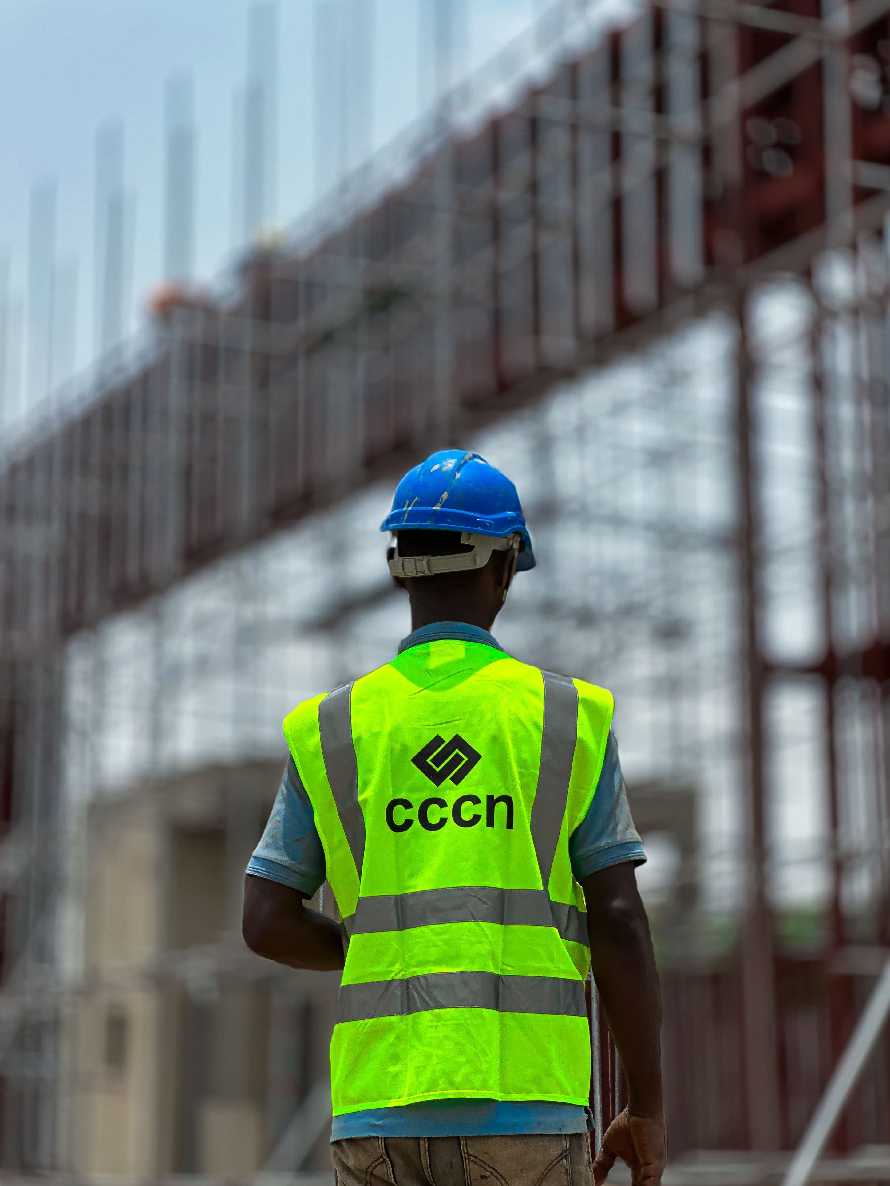Professional team wearing coordinated industrial workwear